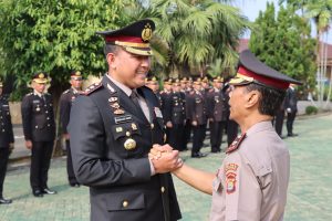Polres Tanggamus Gelar Upacara Kenaikan Pangkat Pengabdian Satu Personelnya