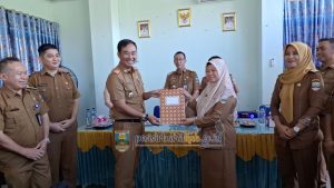 PJ. Sekda Jon Edwar Hadiri Sertijab Kepala Dinkes Pesibar