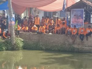 Pasangan Adi Erlansyah-Hisbullah Huda Gelar Lomba Mancing Gratis, Ojo Lali Klambi Oren