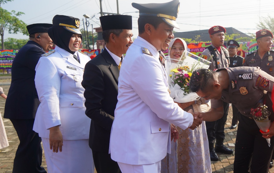 Bupati & Wabup Pringsewu Hadiri Upacara Peringatan Hari Bhayangkara Ke-80  